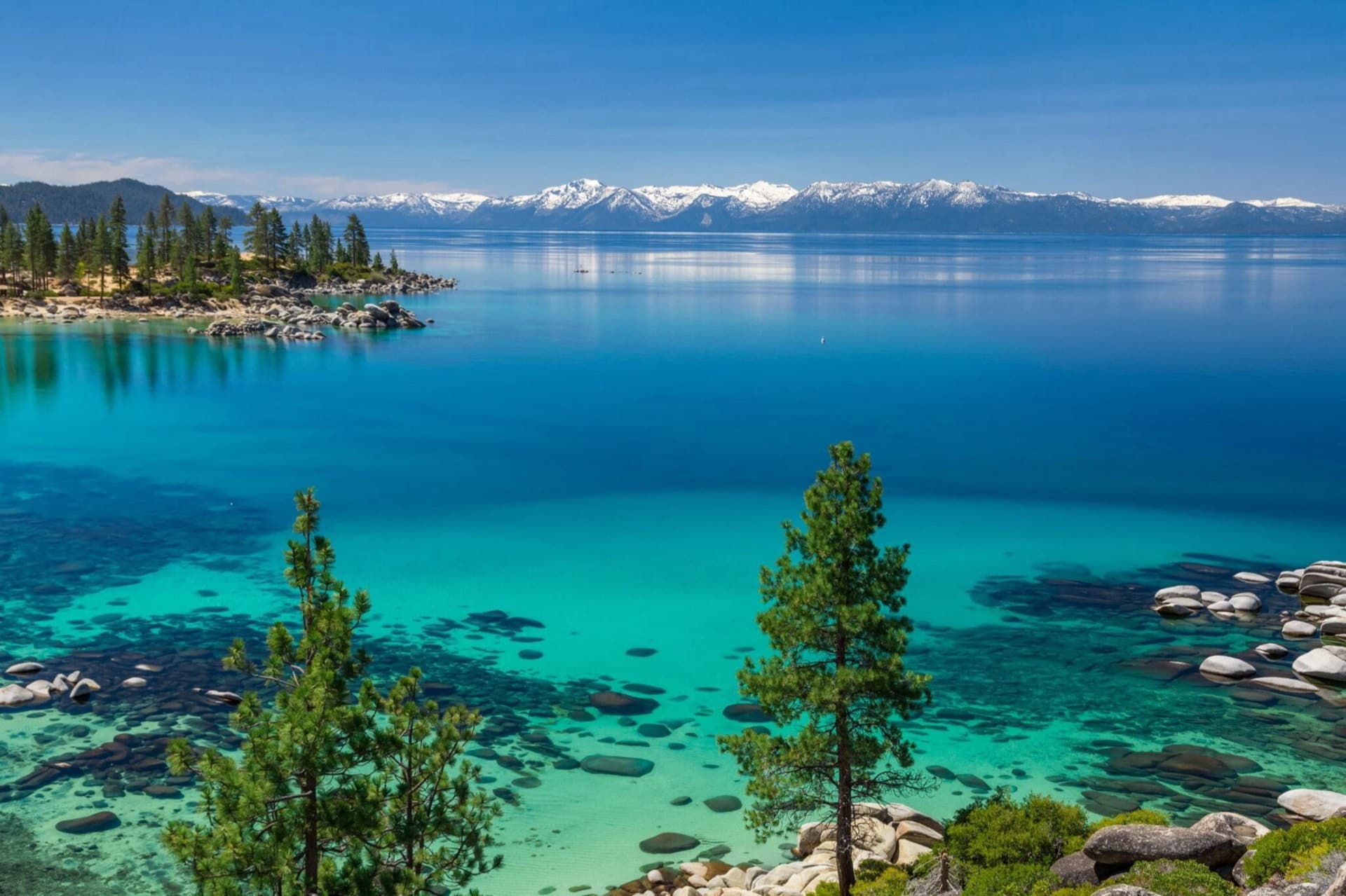 Lake Tahoe shoreline with mountains in the background